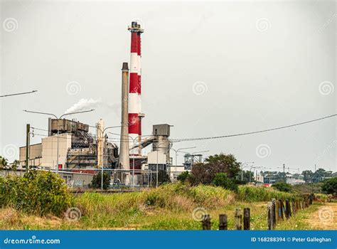 why are factory smokestacks red and white